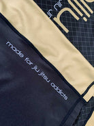 kids bjj rash guard gold black