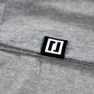 elevate bjj shirt hem tag