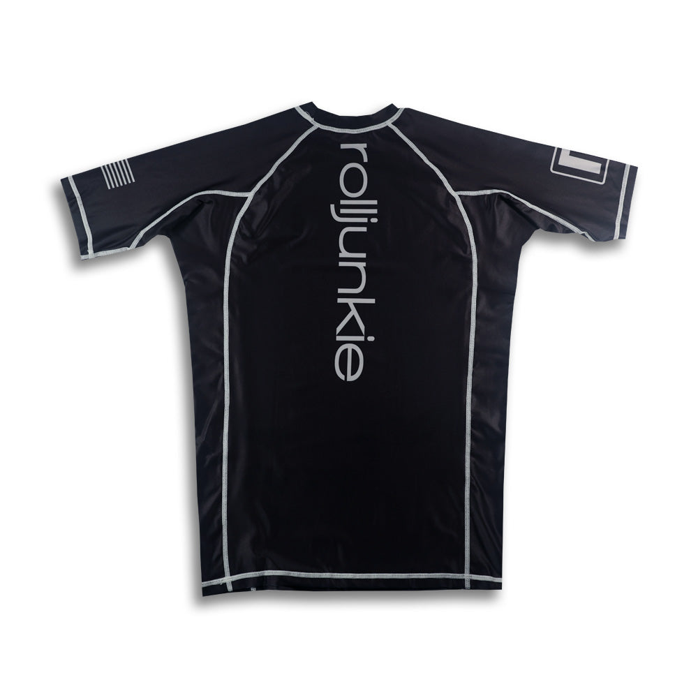 black jiu jitsu rash guard with rolljunkie branding
