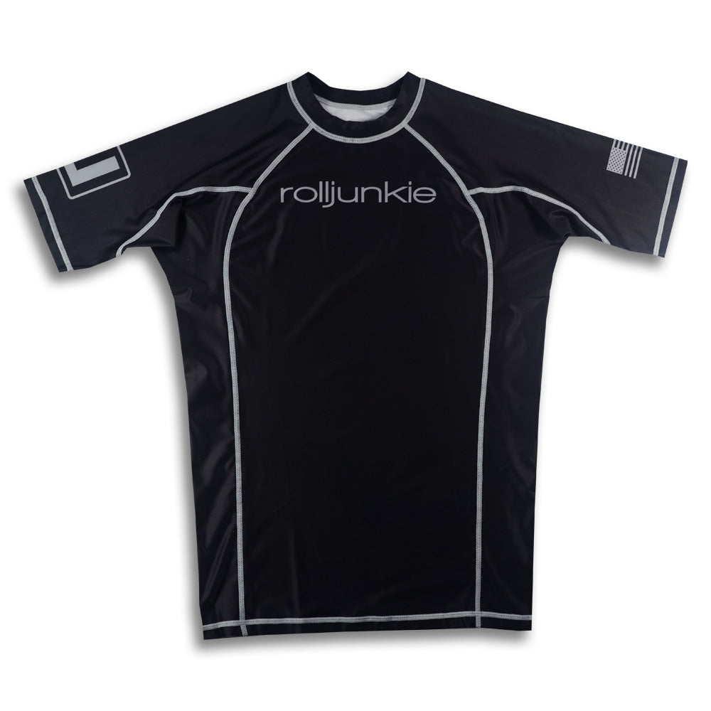 Black rash guard with rolljunkie branding on a white background