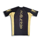 gold and black saint bjj rash guard